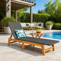 Comfortable Black Lounger with Side Table for Outdoor Relaxation